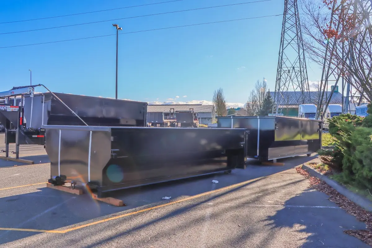 Roll-off dumpster ready for waste disposal at job site for 2 Yard Dumpster Rental in Snyderville